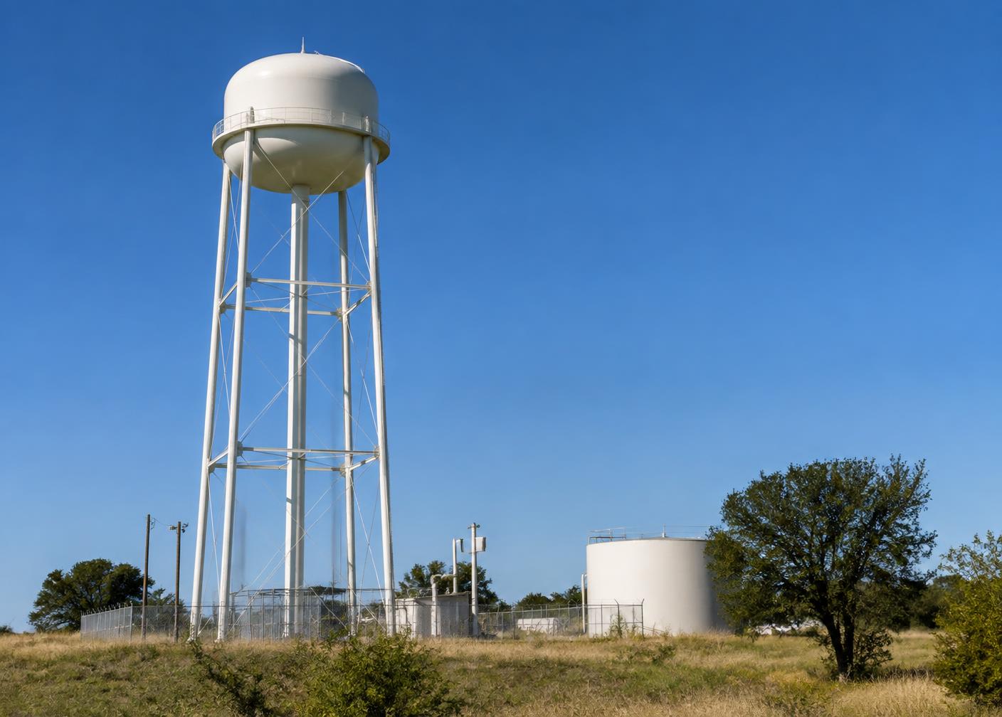 Municipal water tower in a Central Texas landscape